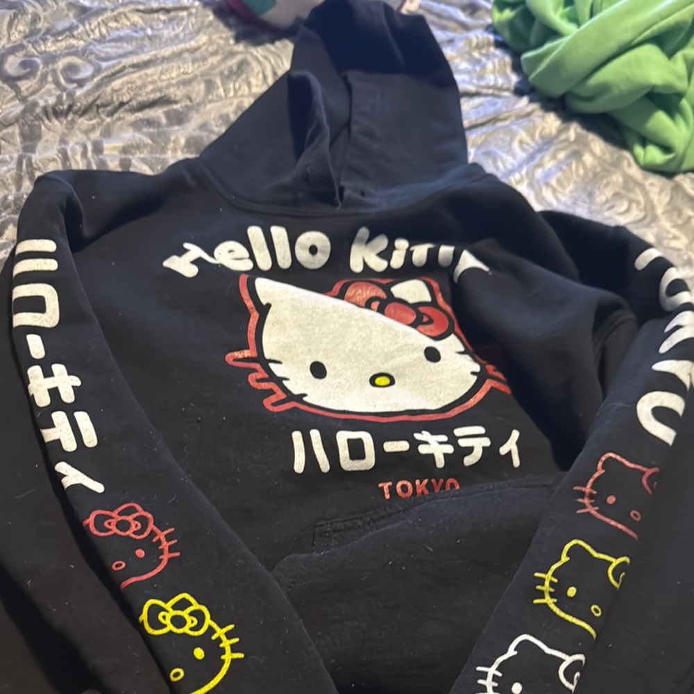 Hello Kitty Black and Red Sweatshirt with Playful Sleeve Design